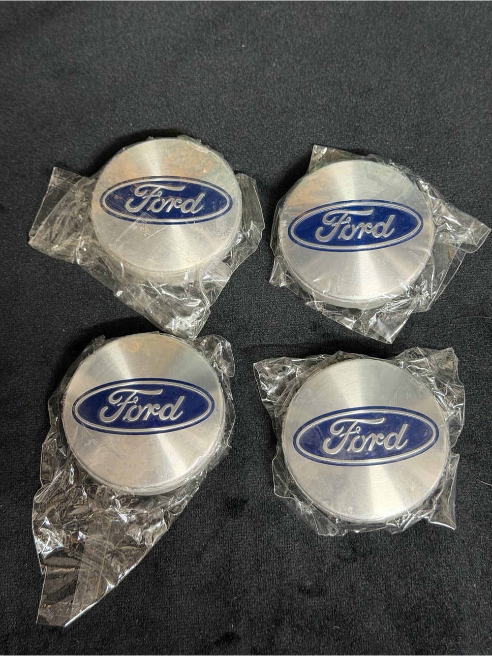 Ford Silver Caps with Blue Oval Logo - 4 Pack